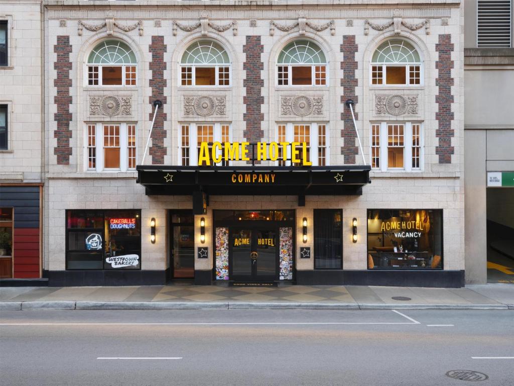 a store front of a building on a city street at ACME Hotel Chicago, Outset Collection by Hilton in Chicago