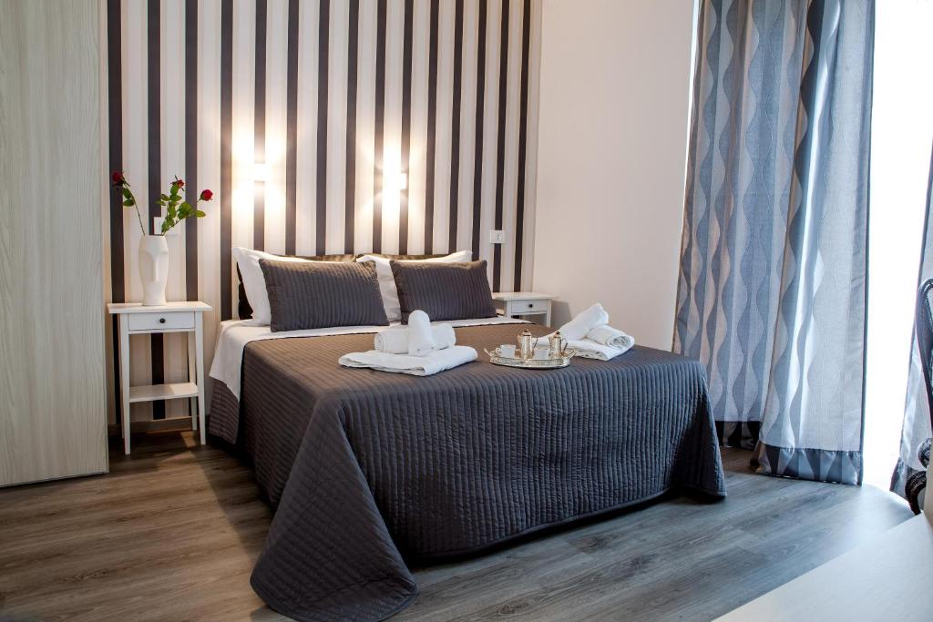 Postel nebo postele na pokoji v ubytování Venere Rooms