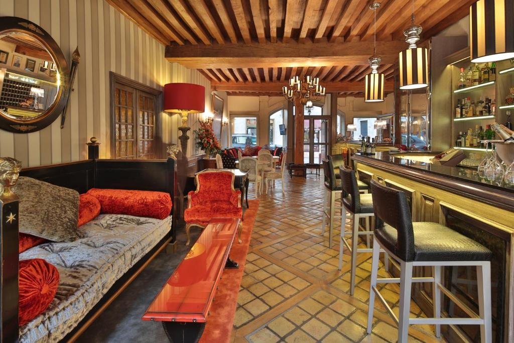 Posezení v ubytování Hôtel Le Cep & Spa