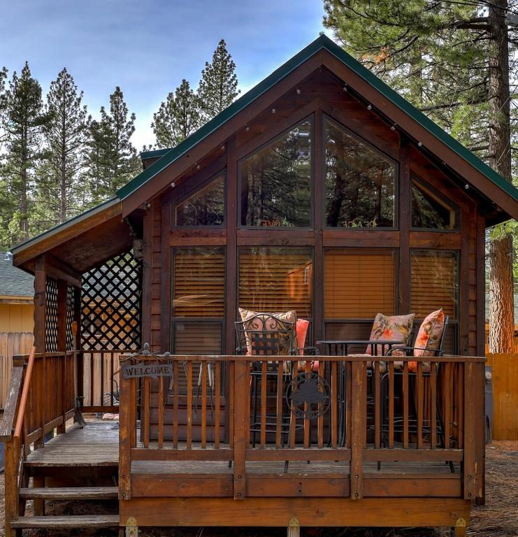 a large wooden gazebo with a screened in porch at Near Ski, Beaches, Pet Friendly, Full kitchen in South Lake Tahoe