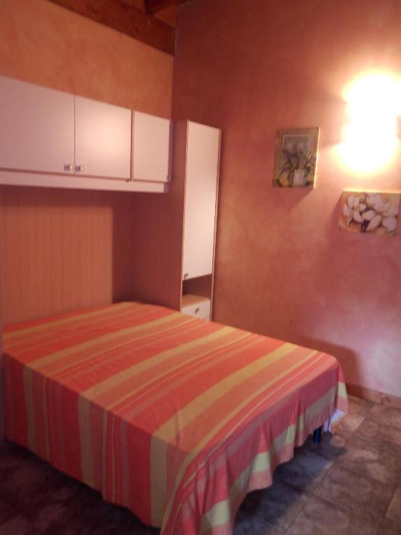 Postel nebo postele na pokoji v ubytování B&B Villa Carla