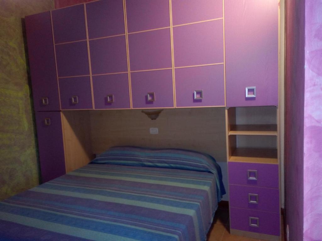 Postel nebo postele na pokoji v ubytování B&B Villa Carla