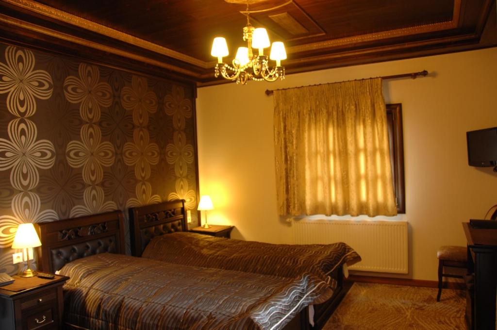 Posteľ alebo postele v izbe v ubytovaní Guesthouse Iridanos