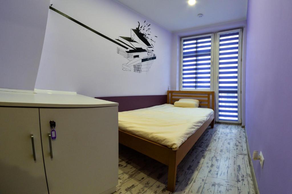 Posteľ alebo postele v izbe v ubytovaní Event Hostel - Opole