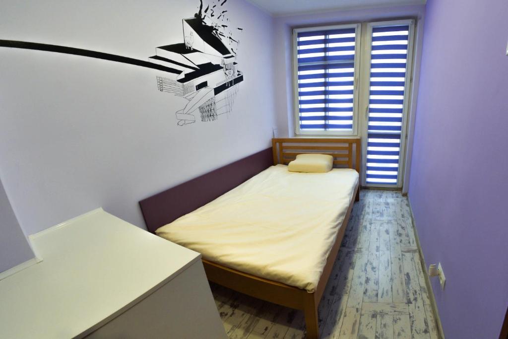 Posteľ alebo postele v izbe v ubytovaní Event Hostel - Opole