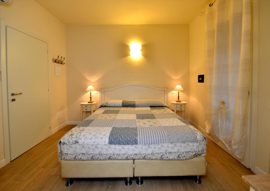 Postel nebo postele na pokoji v ubytování B&B Villa Bianca