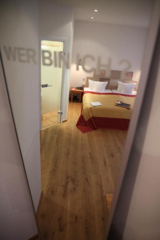 Postel nebo postele na pokoji v ubytování Hotel Drei Raben