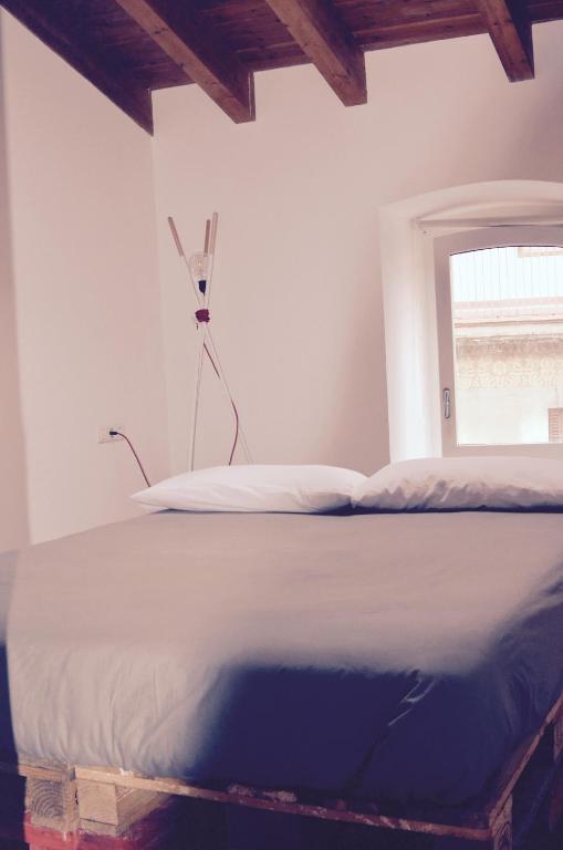 Postel nebo postele na pokoji v ubytování CasaOller