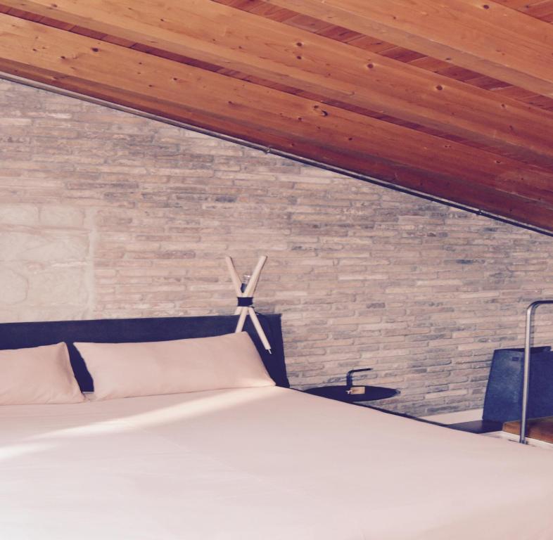 Кровать или кровати в номере CasaOller