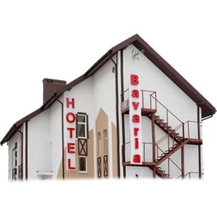 a building with a sign on the side of it at BavariaHotel in Kharkiv