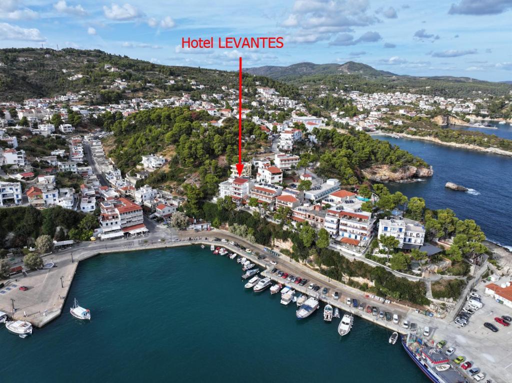 an aerial view of a town with boats in the water at Levantes Hotel in Patitiri