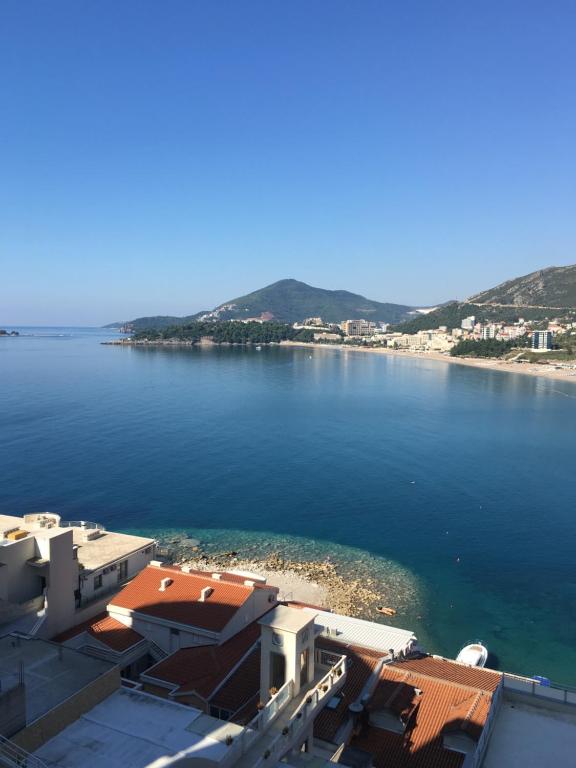 a view of a large body of water with buildings at Luxury Apartments Trend in Budva
