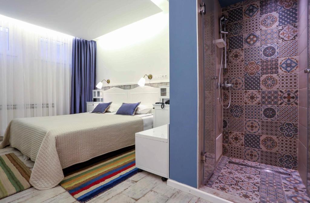 Postel nebo postele na pokoji v ubytování Hotel Divan