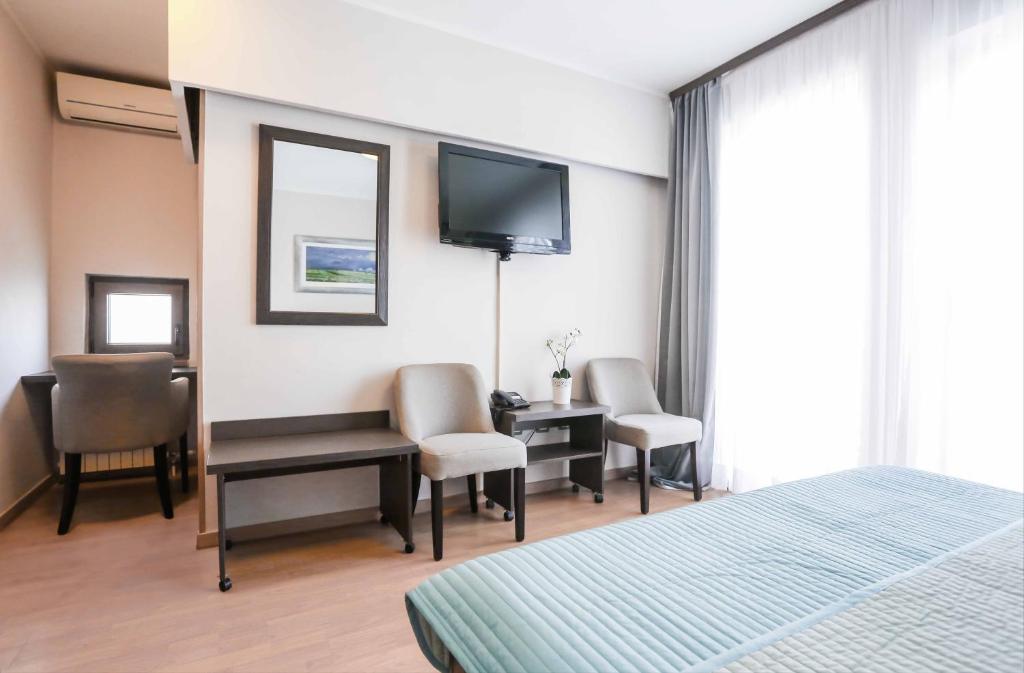 Postel nebo postele na pokoji v ubytování Hotel Divan