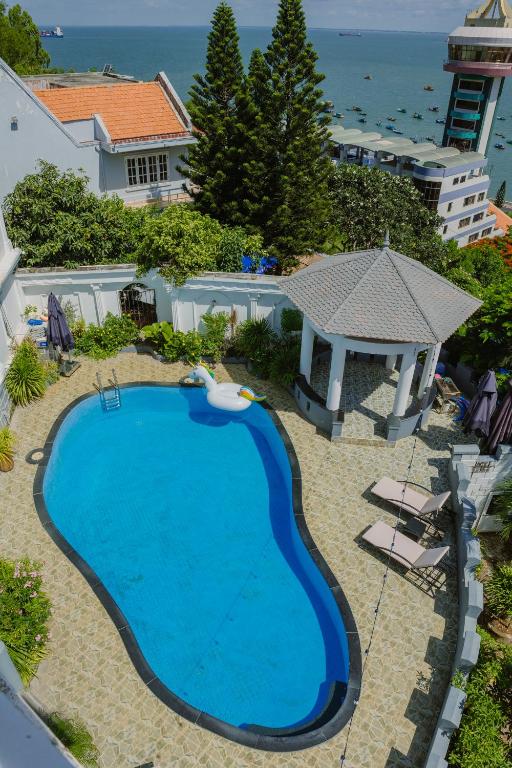 an overhead view of a swimming pool in a resort at The View Boutique Hotel in Vung Tau