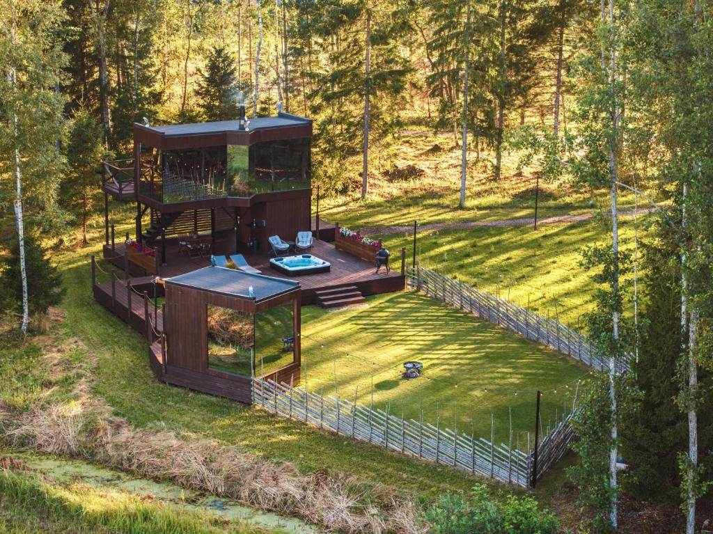 an overhead view of a tree house in the woods at Luxury Resort Kabuna in Kabuna