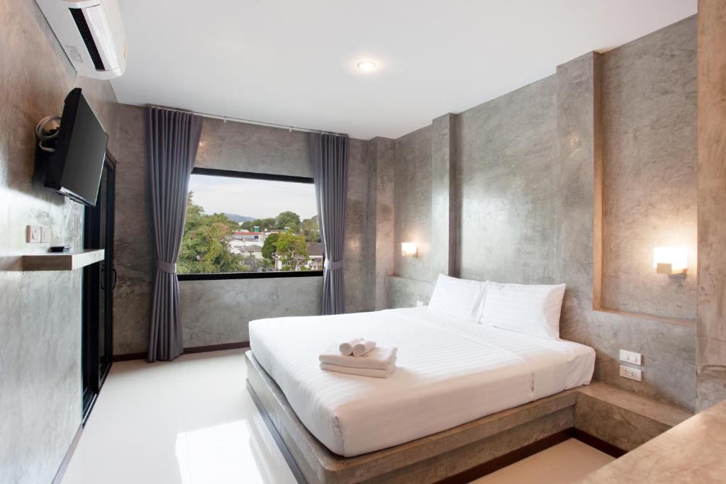 Ritsurin Boutique Hotel - โรงแรมริทสุริน บูติค