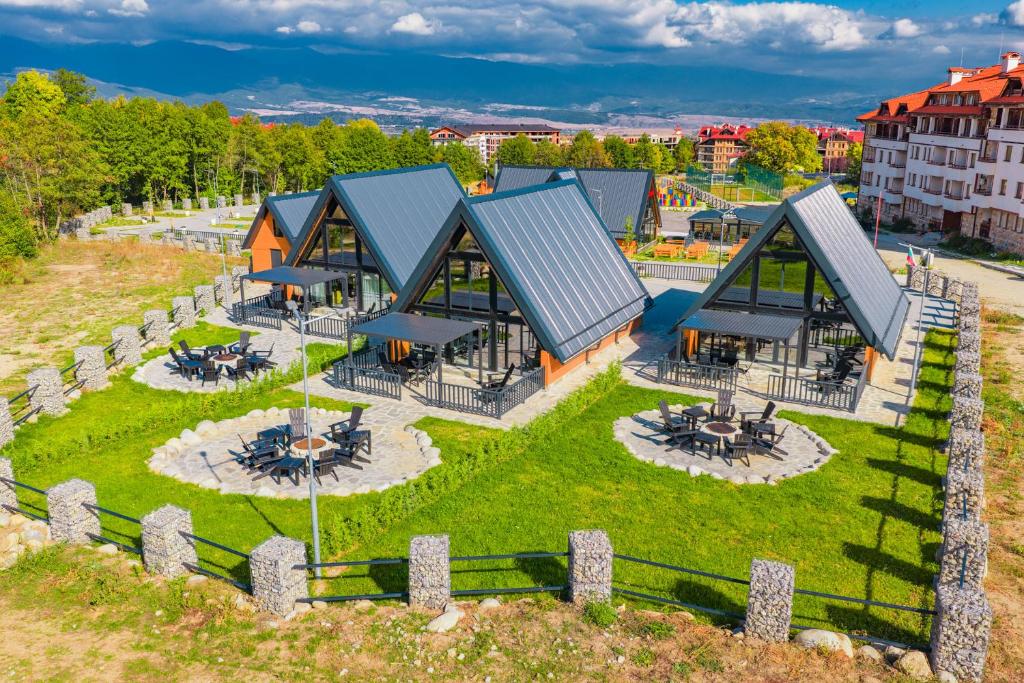 an aerial view of a building with a yard at Camping Bansko "Between the Mountains" in Bansko