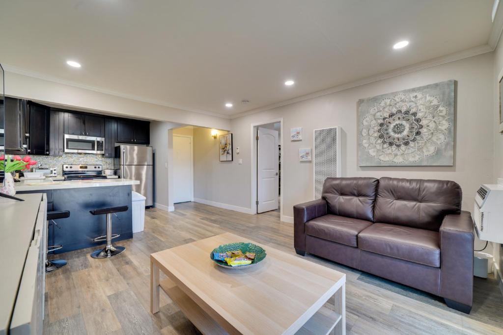 a living room with a couch and a table at Pleasanton Gem in Quiet Community w/ Pool Access in Pleasanton
