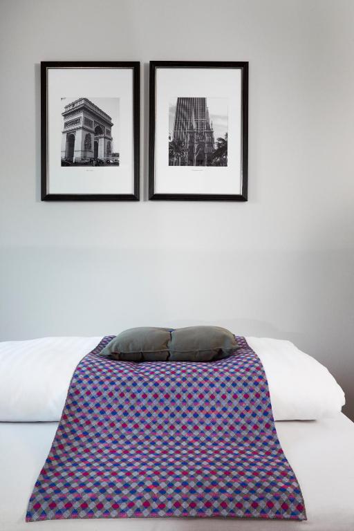 Postel nebo postele na pokoji v ubytování Hotel Cabinn Vejle