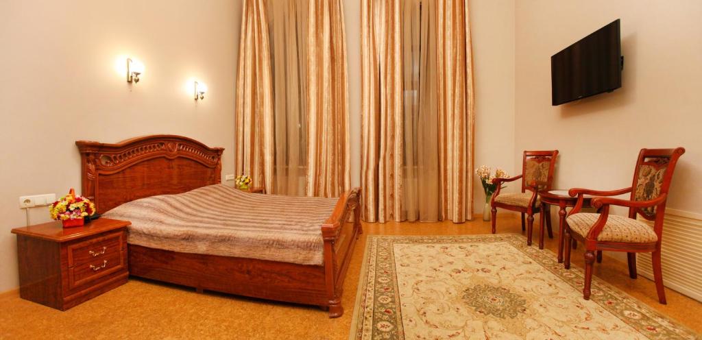TV a/nebo společenská místnost v ubytování Ekaterina Hotel