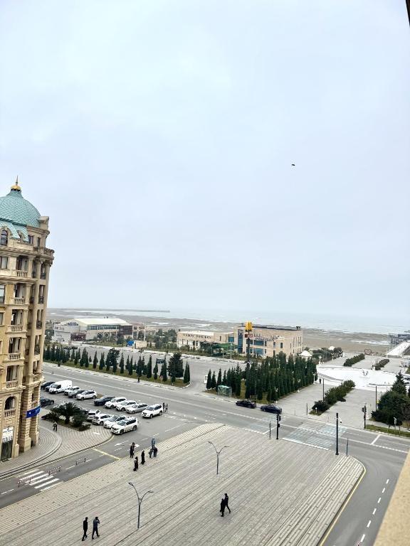 a view of a city with a street and a building at Sumgayit Apart House in Sumqayıt