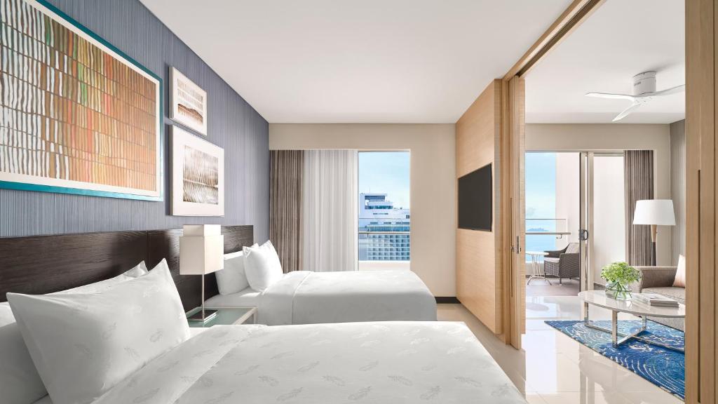 Two-Bedroom King Suite with Two Single Beds and City View