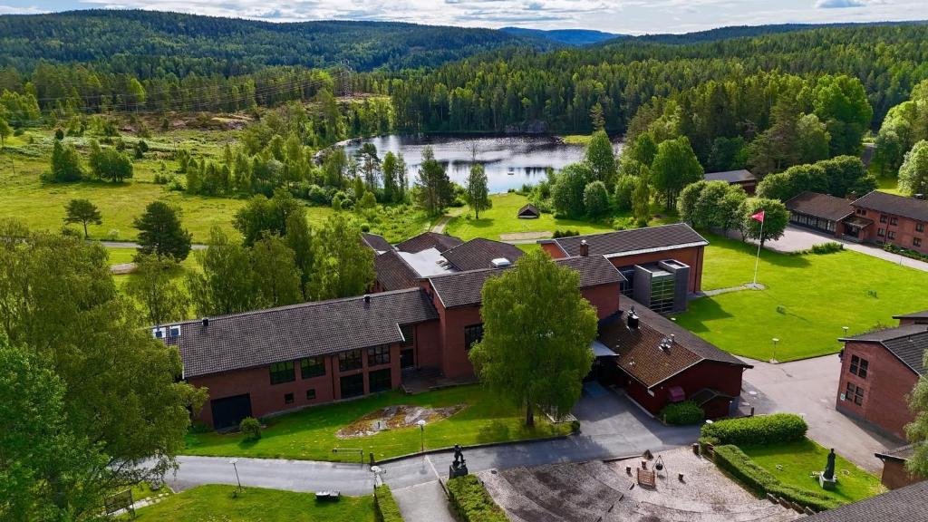 an aerial view of a large building with a yard at Sørmarka Konferansehotell in Siggerud