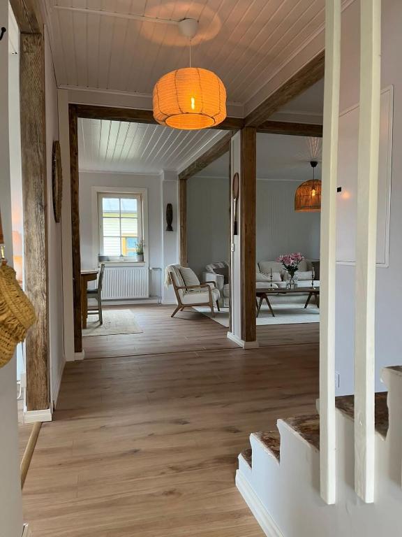 a hallway with a living room and a dining room at Cozy big villa in Hanko in Hanko