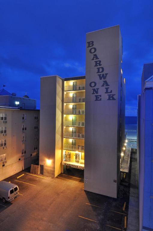 a building with a sign on the side of it at Boardwalk One- Studio w Balcony and Partial Ocean View in Ocean City