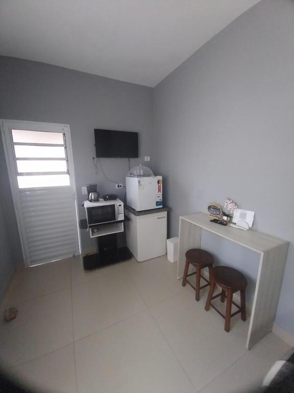 Suite confortável no centro com Wi fi e Smart TV