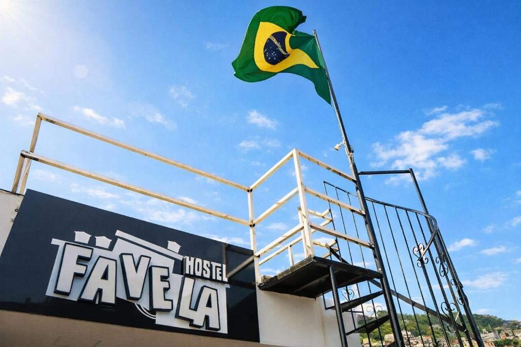 a flag on the side of a stadium at Favela Hostel in Rio de Janeiro