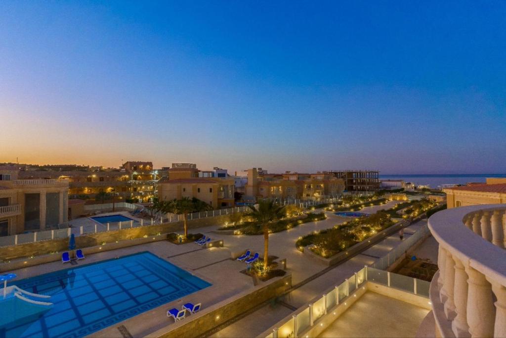 arial view of a city with a swimming pool at Arena Beach Resort & Spa in Hurghada