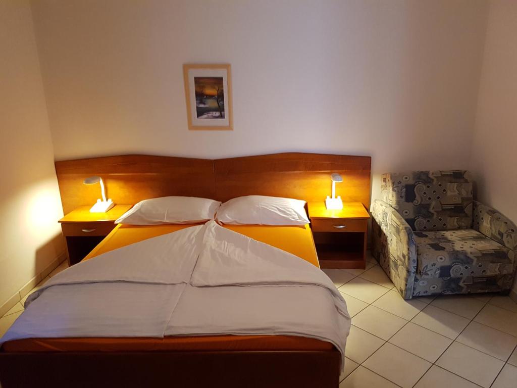 Postel nebo postele na pokoji v ubytování Guesthouse Villa Adria