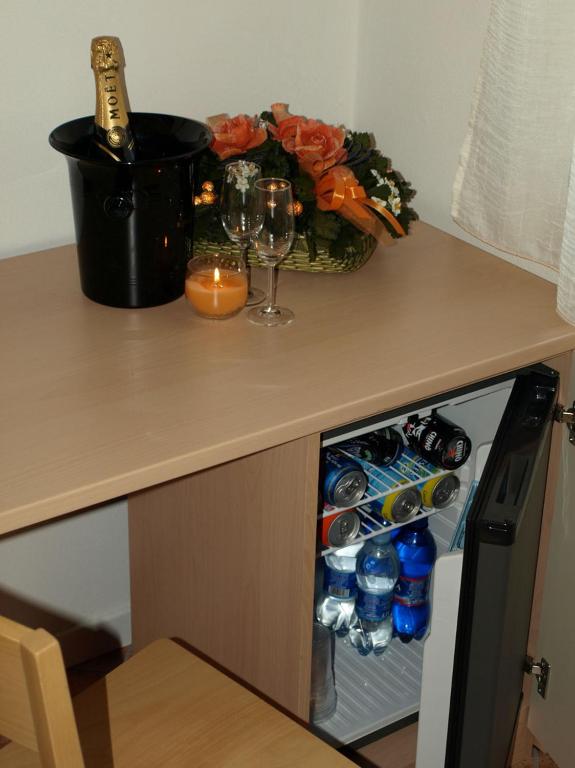 Kuchyň nebo kuchyňský kout v ubytování Hotel Karol