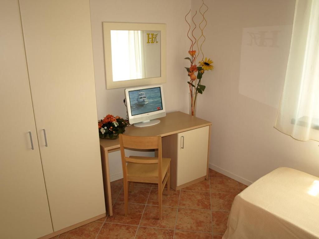 Postel nebo postele na pokoji v ubytování Hotel Karol