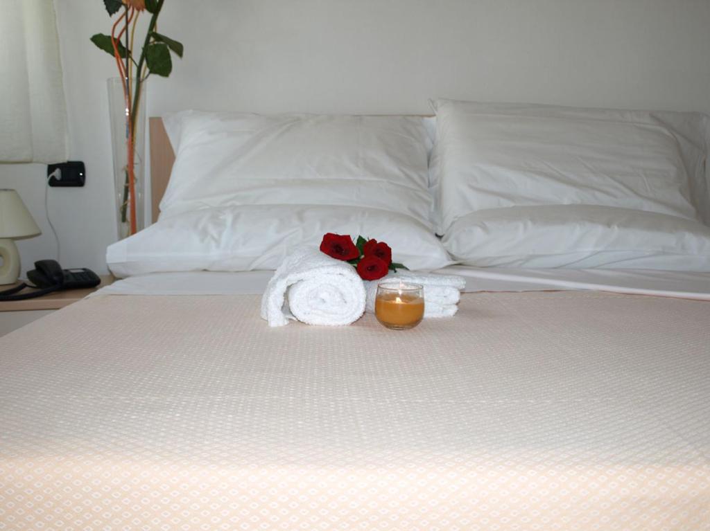 Postel nebo postele na pokoji v ubytování Hotel Karol
