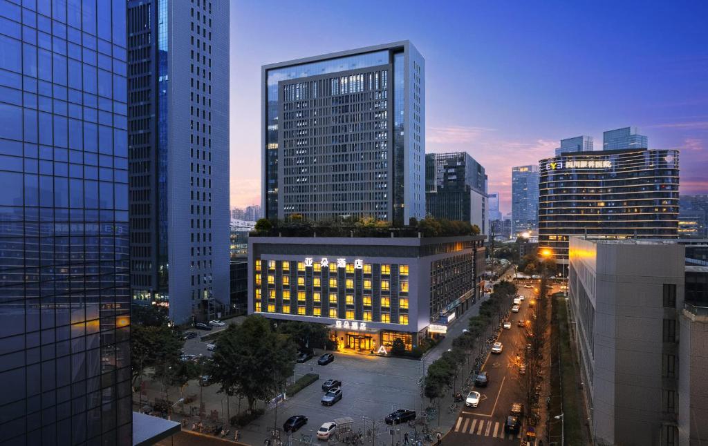 an aerial view of a city with tall buildings at 成都高新天府三街亚朵酒店 in Chengdu