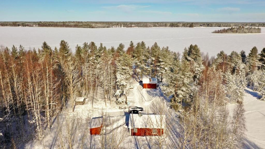 an aerial view of a ski resort in the snow at Savupirtti 1819 in Pudasjärvi