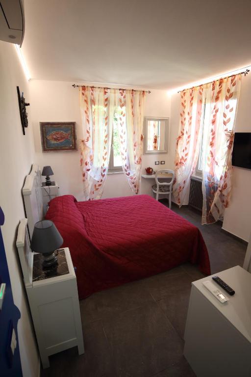 Postel nebo postele na pokoji v ubytování 5 TERRE PELAGOS