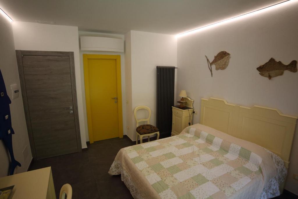 Postel nebo postele na pokoji v ubytování 5 TERRE PELAGOS