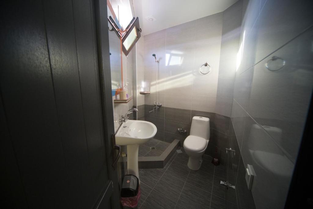Koupelna v ubytování Hotel Nikala