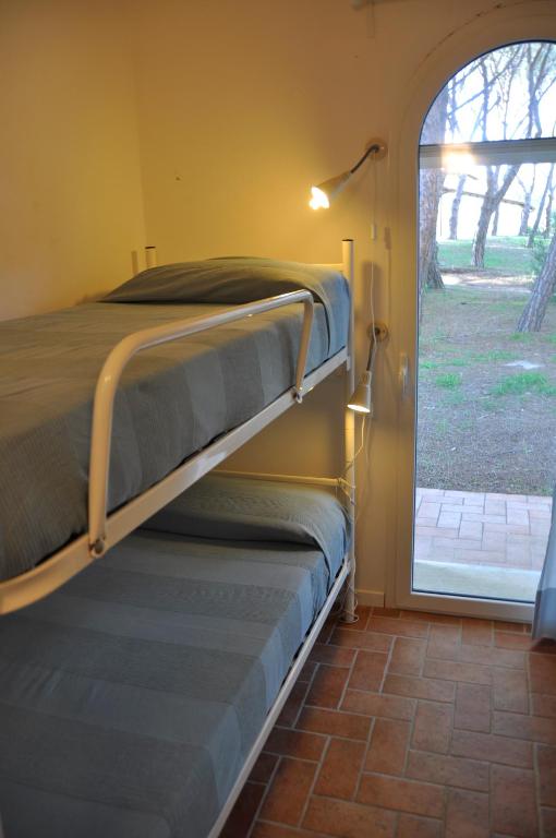 Posteľ alebo postele v izbe v ubytovaní Tenuta le marze