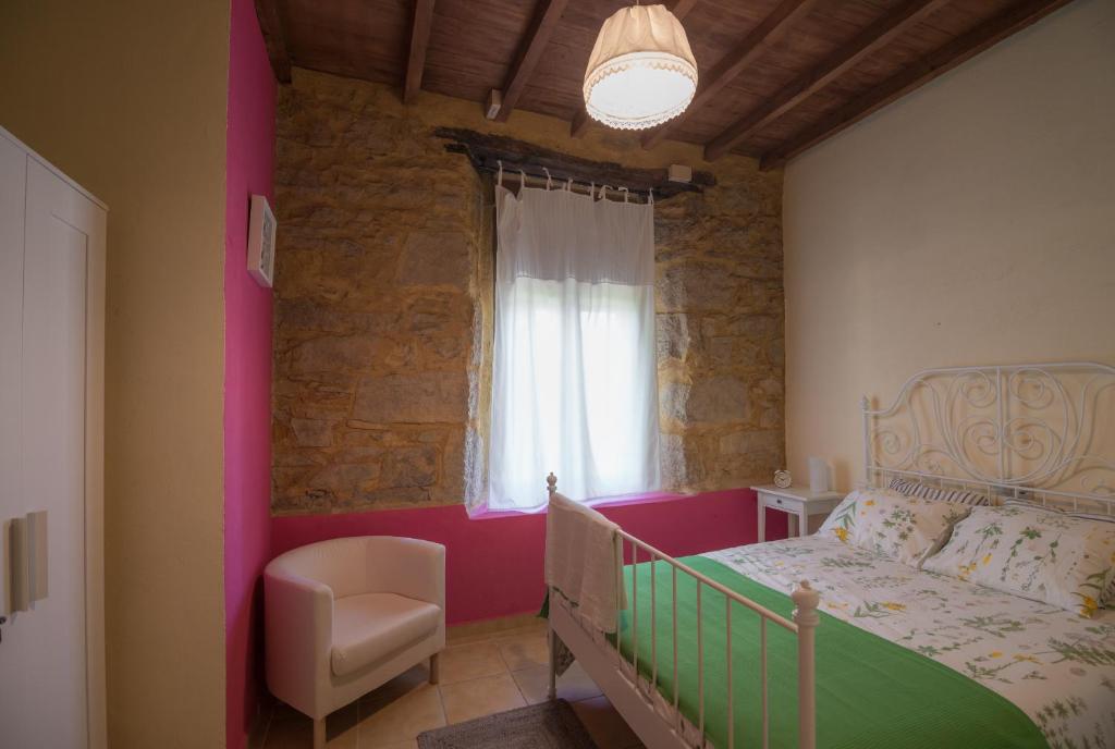 Postel nebo postele na pokoji v ubytování Casa Rural La Rana