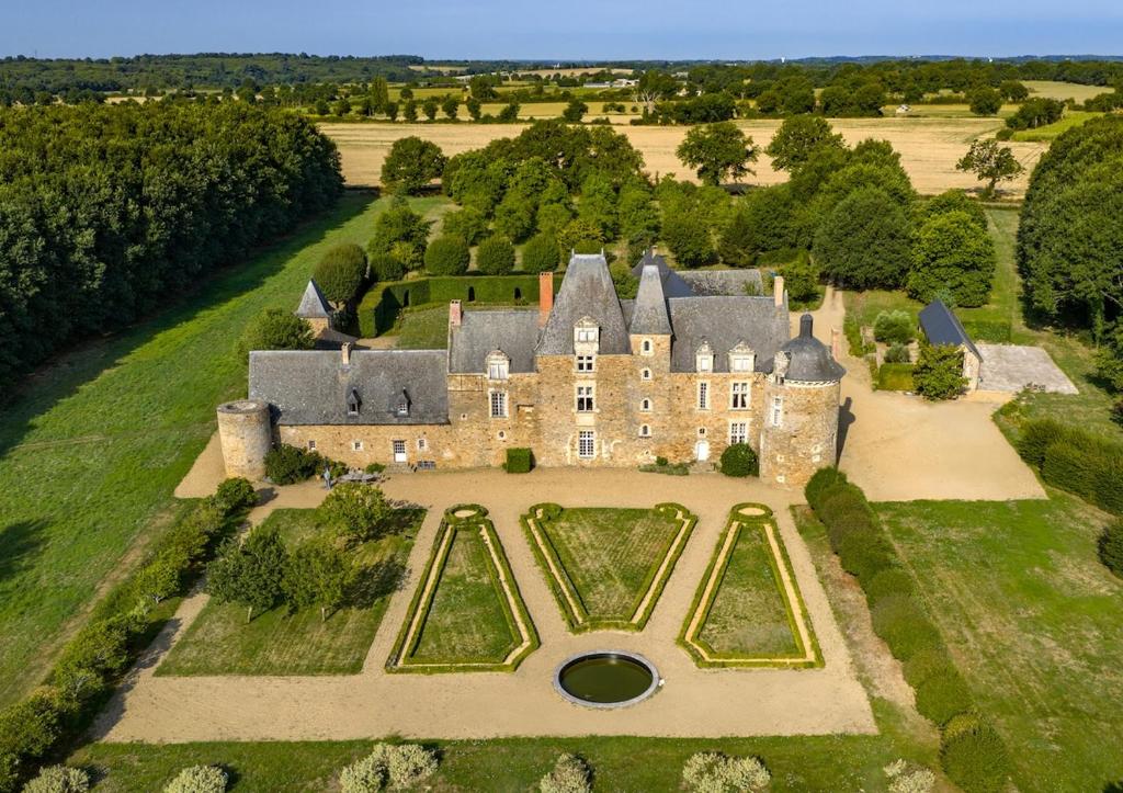 an aerial view of an estate with a large castle at Château du Hardas in Segré