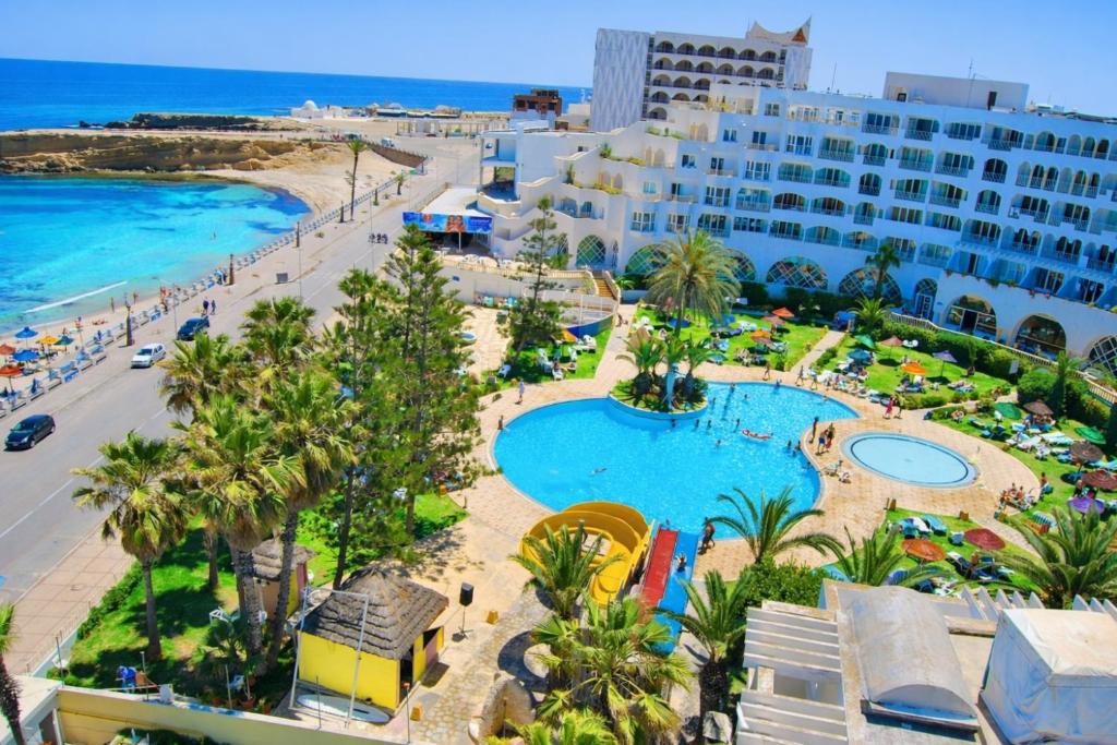 an aerial view of a resort with a swimming pool at Hotel El Habib Monastir in Monastir
