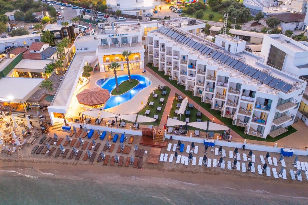 an aerial view of a resort on the beach at Mimoza Beach Hotel in Yenibosazici