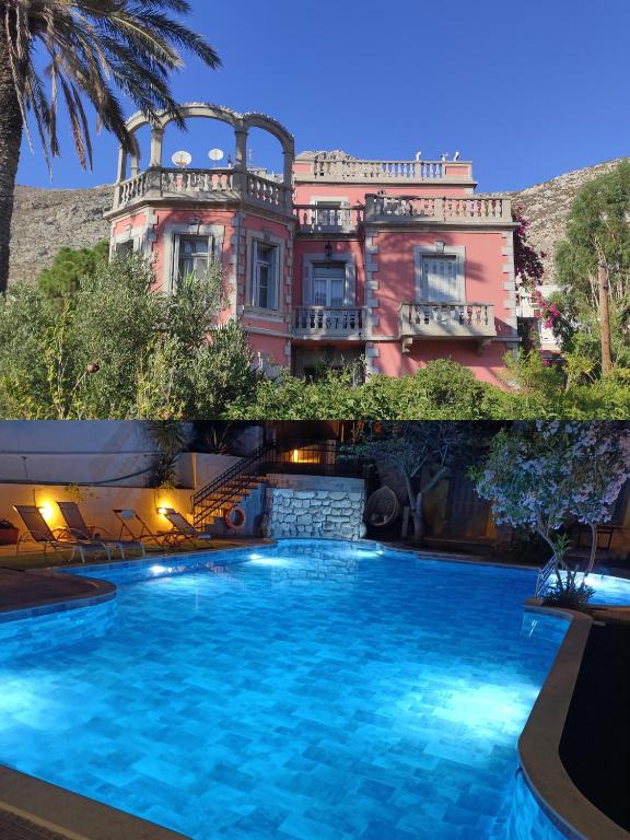 a large house with a swimming pool in front of it at Villa Melina Hotel in Kalymnos
