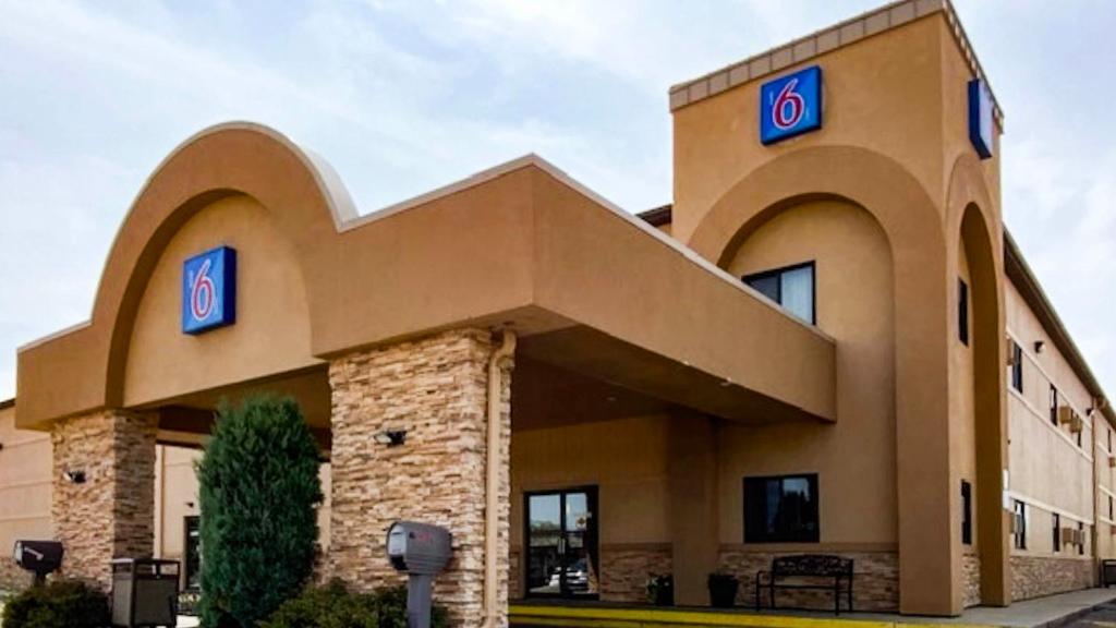 a building with a no sign on it at Studio 6 - Minot, ND in Minot