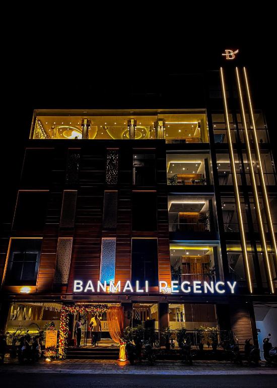 a building with a sign that reads bankall agency at BANMALI REGENCY in Jamshedpur